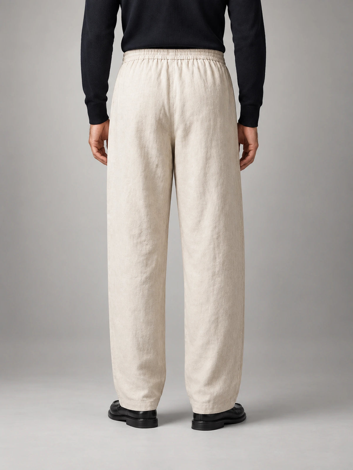 Men's Drawstring Baggy Linen Trousers in Natural — back view