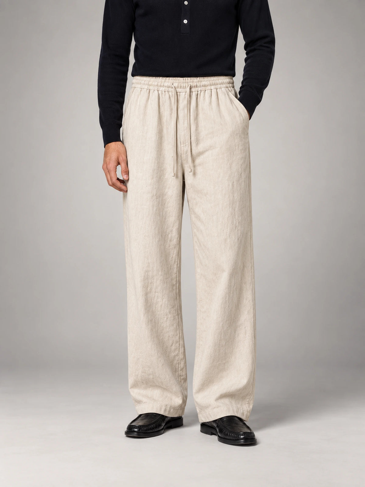 Men's Drawstring Baggy Linen Trousers in Natural — front view