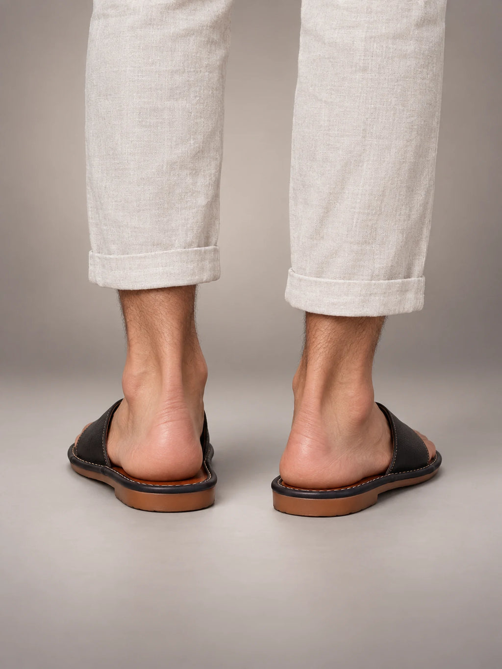 Volantero Men's Textured Leather Open-Toe Slide Sandals in Black, back view