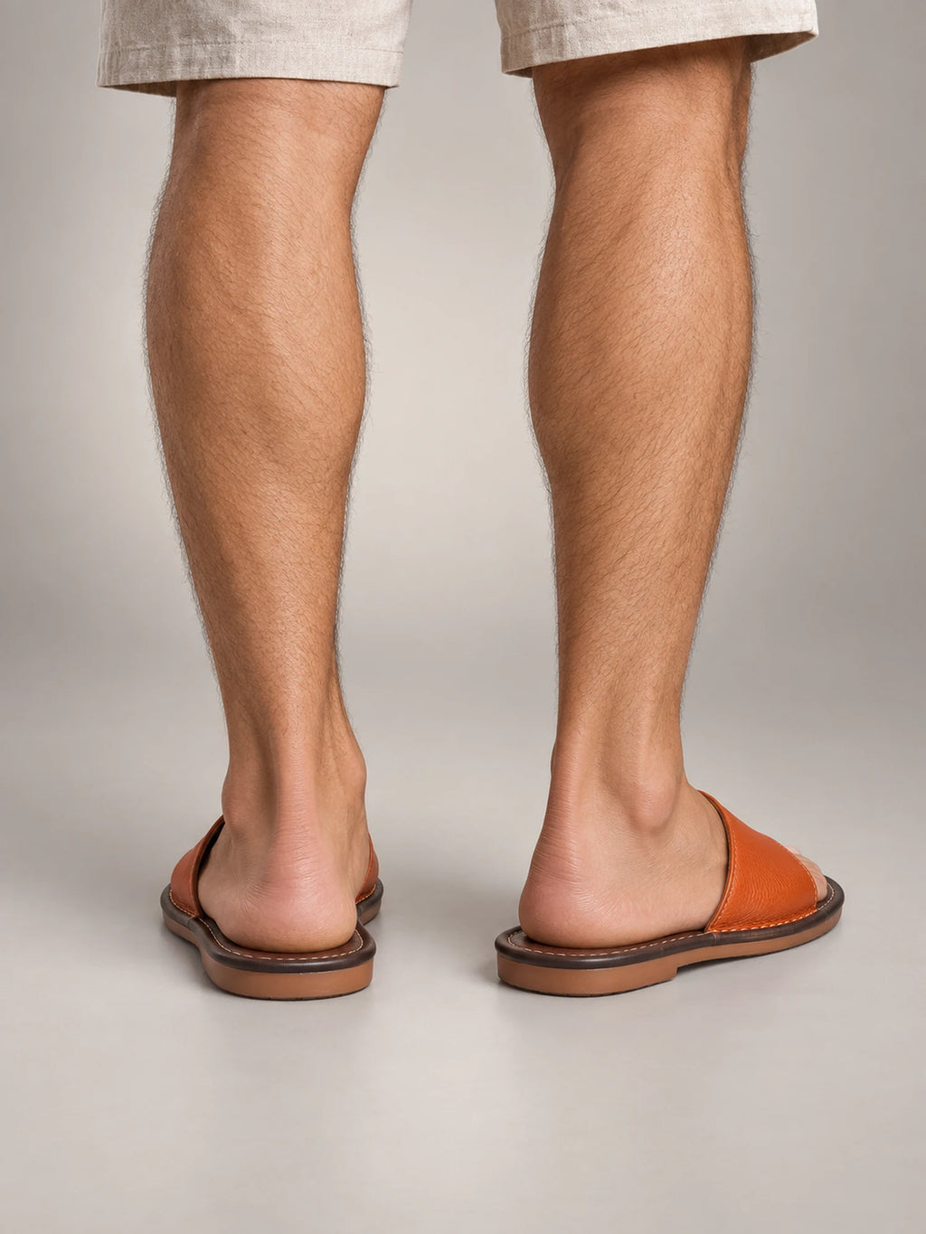 Volantero Men's Textured Leather Open-Toe Slide Sandals in Orange, back view