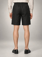 Volantero Men's Linen Drawstring Shorts in Black, back view