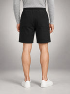 Volantero Men's Fleece Drawstring Shorts in Black, back view