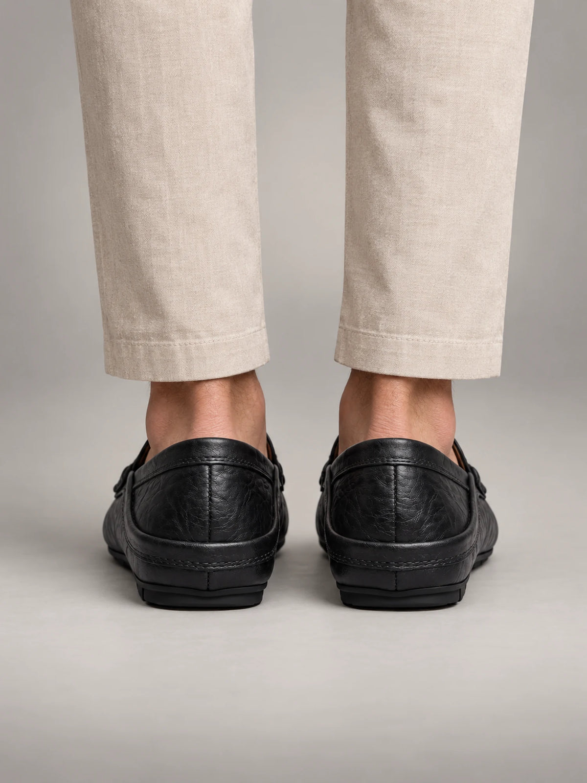 Volantero Men's Leather Travel Loafers with Fold Down Heel in Black, back view