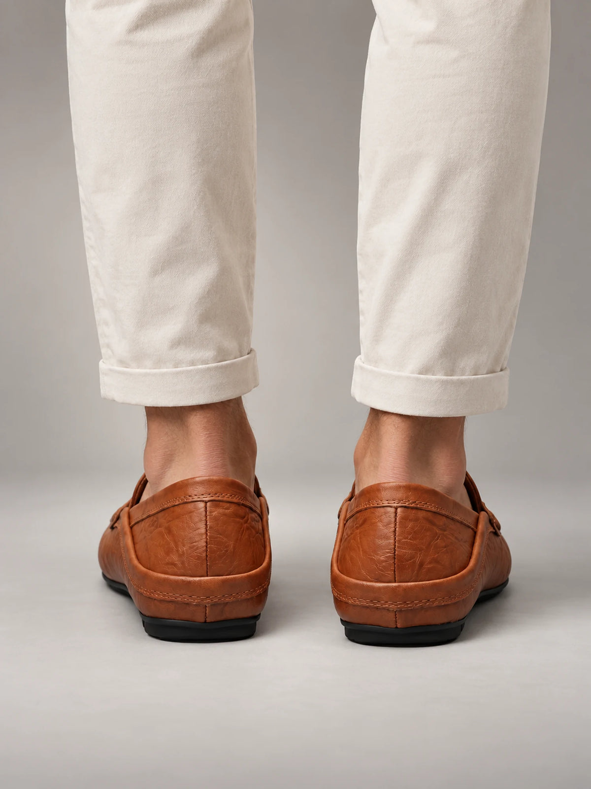 Volantero Men's Leather Travel Loafers with Fold Down Heel in Brown, back view