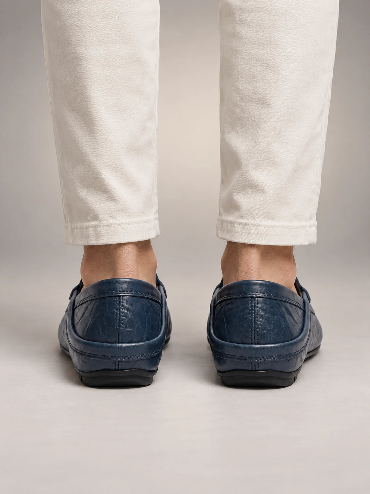 Volantero Men's Leather Travel Loafers with Fold Down Heel in Navy, back view