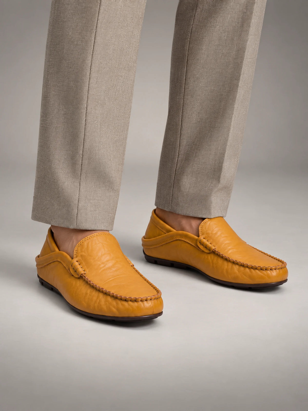 Volantero Men's Leather Travel Loafers with Fold Down Heel in Yellow, front view