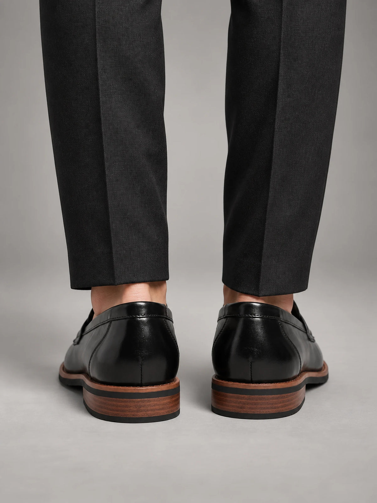 Volantero Men's Classic Leather Penny Loafers in Black, back view