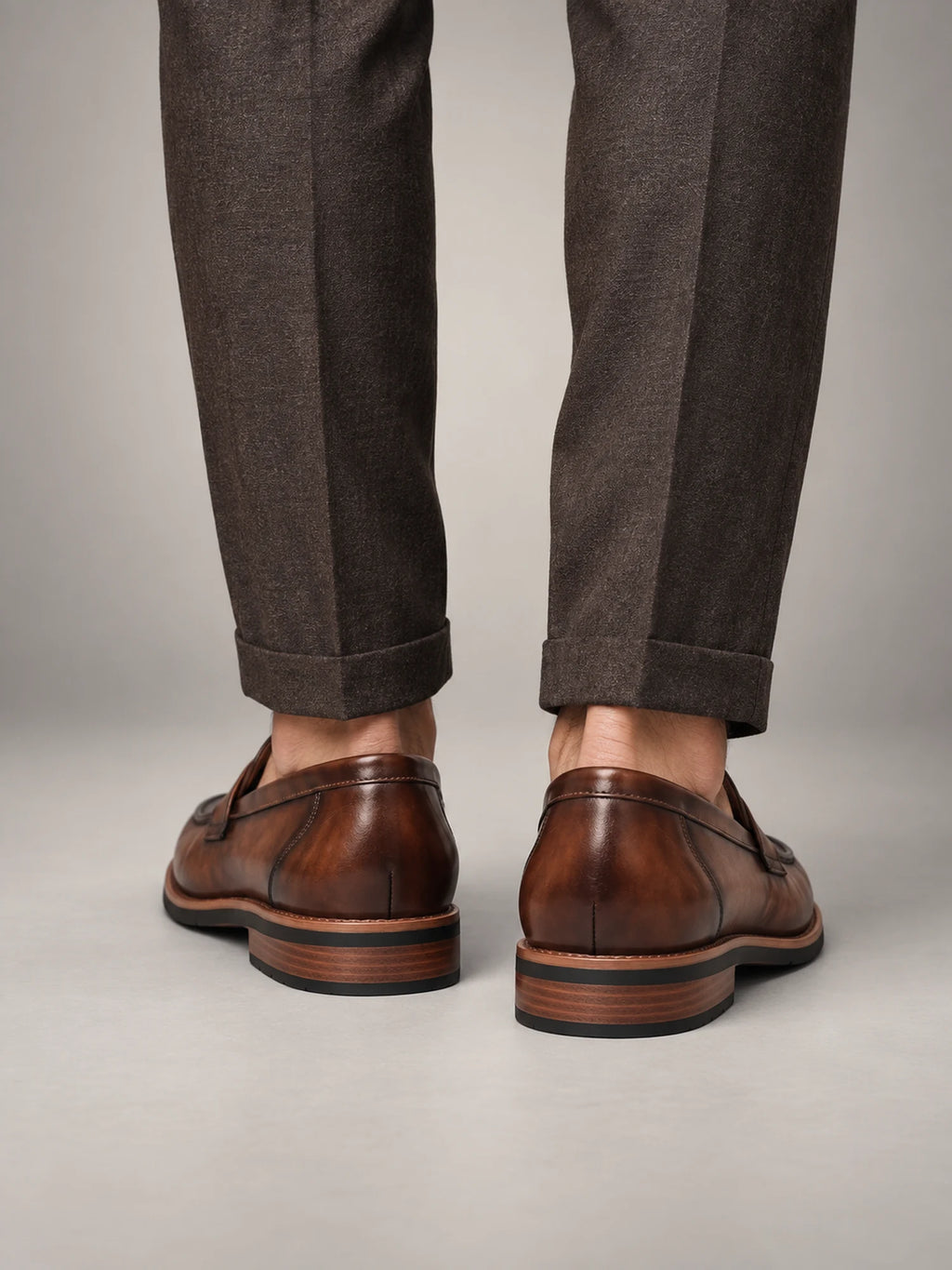 Volantero Men's Classic Leather Penny Loafers in Brown, back view