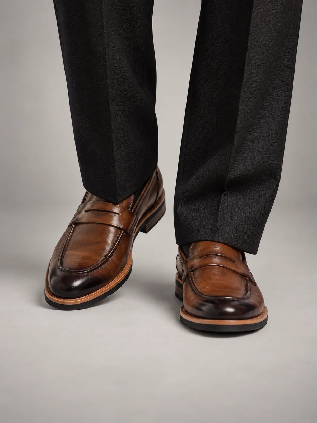 Volantero Men's Classic Leather Penny Loafers in Brown, front view